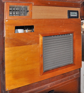 The aft AC unit front panal allows for inspection of the guages through the cutout in the front cover.