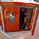 Solid teak doors were built with picture windows of lighthouses.