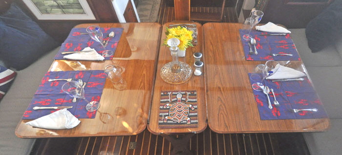 The new teak table seats five