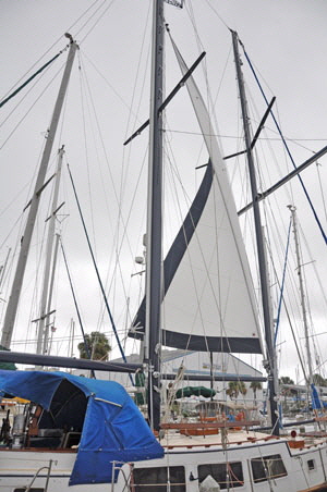The between-mast staysail opens up to become a fine driving sail on a reach.