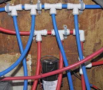 The main distribution manifold from the pump to all outlets.