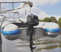 The electric hoist will easily lift the heavy RIB and its outboard motor.
