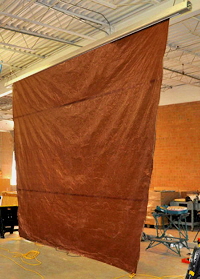 The first trial of the test tarp sail in the warehouse.
