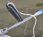 CS Johnson's turnbuckle tool is used to tighten the lines.