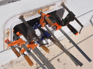 It was necessary to remove the screen and gasket to be able to clamp the new port in place.