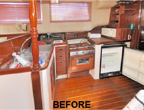 This shows the original galley with an old stove and refigerator that did not work properly.